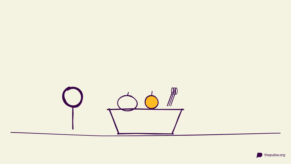 Handgezeichnete Illustration: Erntekorb mit Kürbis, gelbem Apfel und Ähren