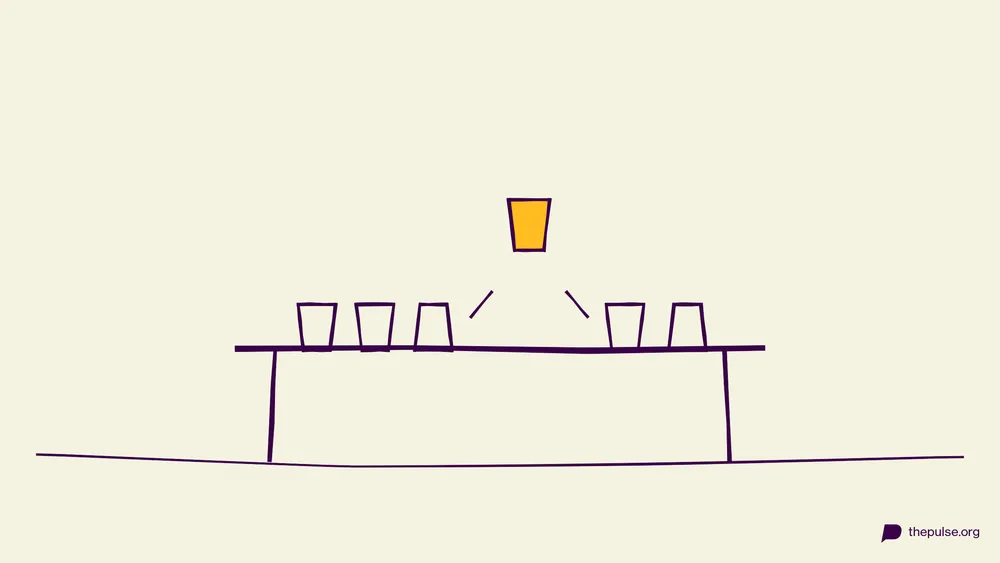 Illustration: Becher auf einem Tisch, ein gelber Becher fliegt