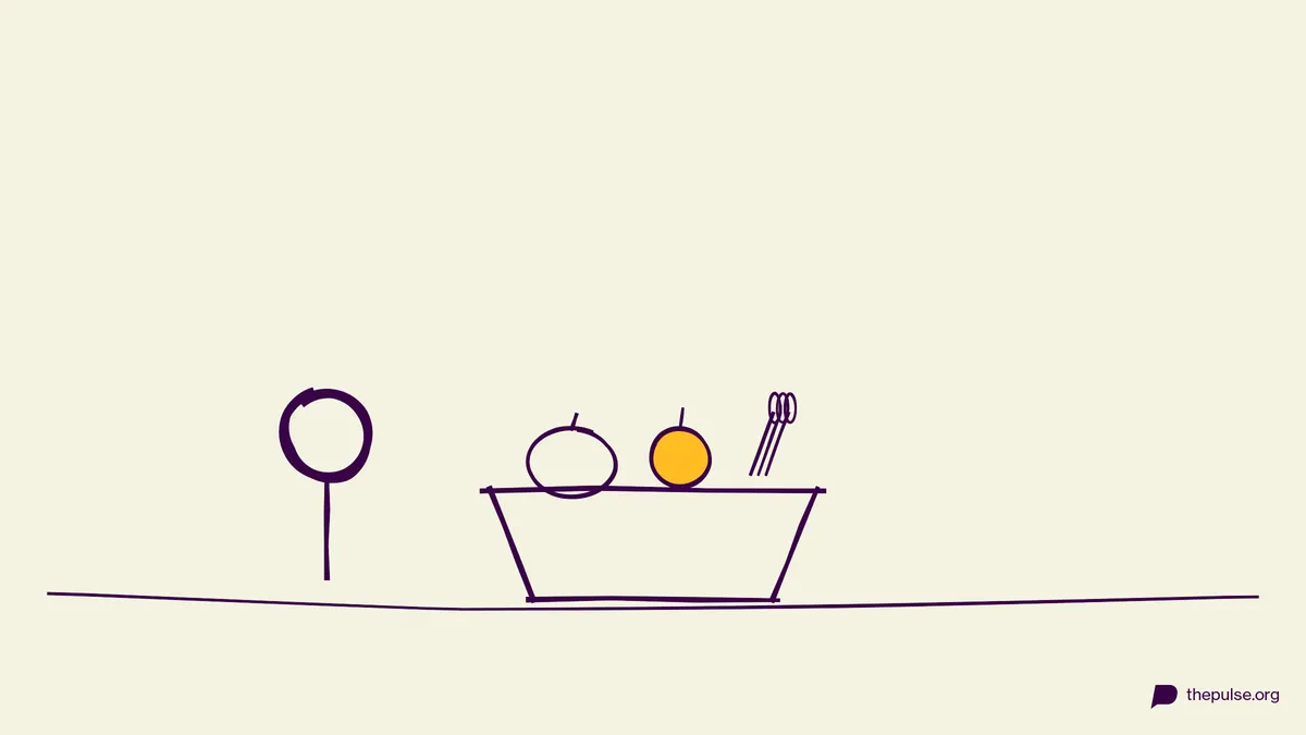 Handgezeichnete Illustration: Erntekorb mit Kürbis, gelbem Apfel und Ähren