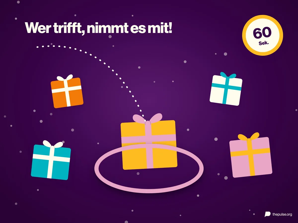 Ein Hula-Hoop-Reifen liegt um ein Geschenk, ringsum weitere Geschenke